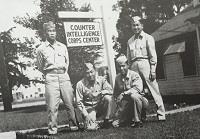 Nisei military members pose in uniform